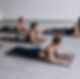 yoga-group-classes-inside-gym_1303-14796